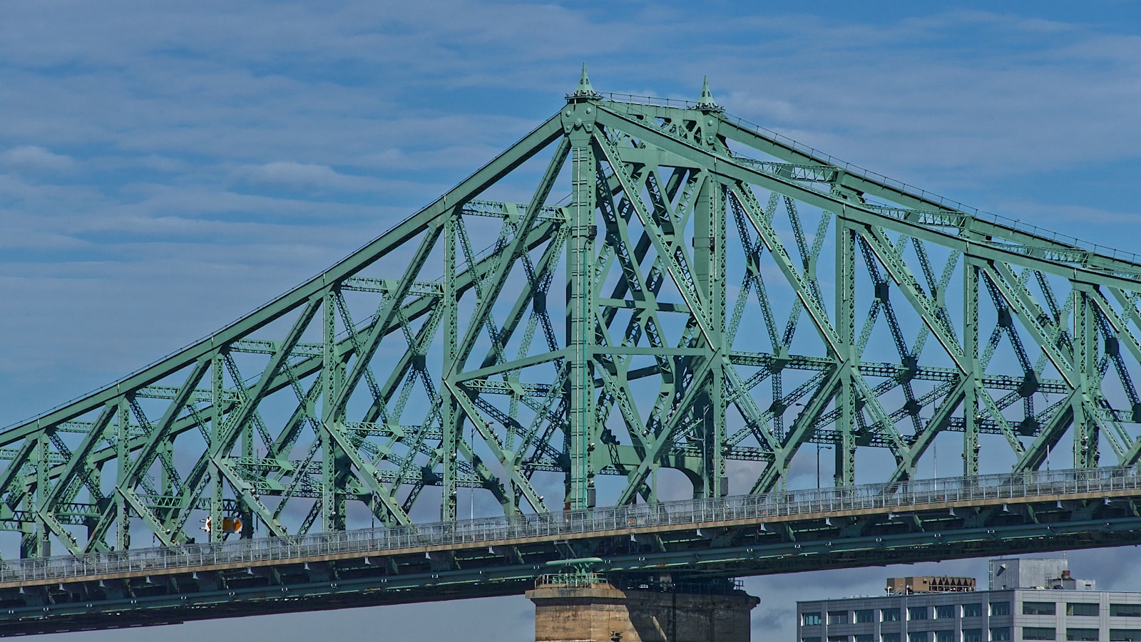 grey metal bridge during daytime